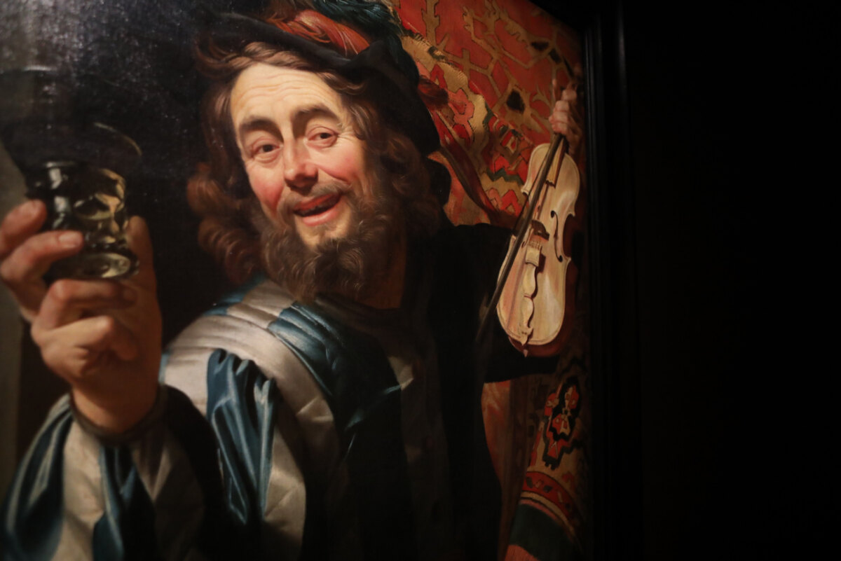 Detail van het schilderij Een Vrolijke Vioolspeler.