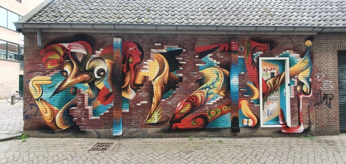 De muurschildering van Munir de Vries en Luna van der Straaten met de titel ‘Janus’ (foto De Vries)