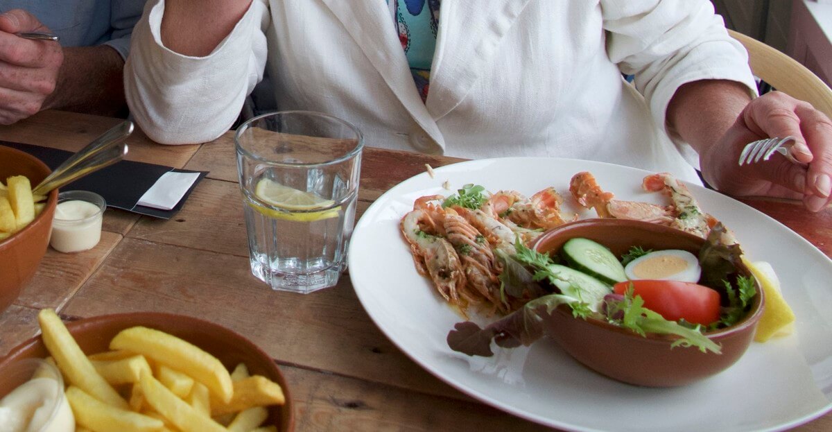 Alleen parasieten betalen niet voor een goed bord eten. Foto: Ton van den Berg
