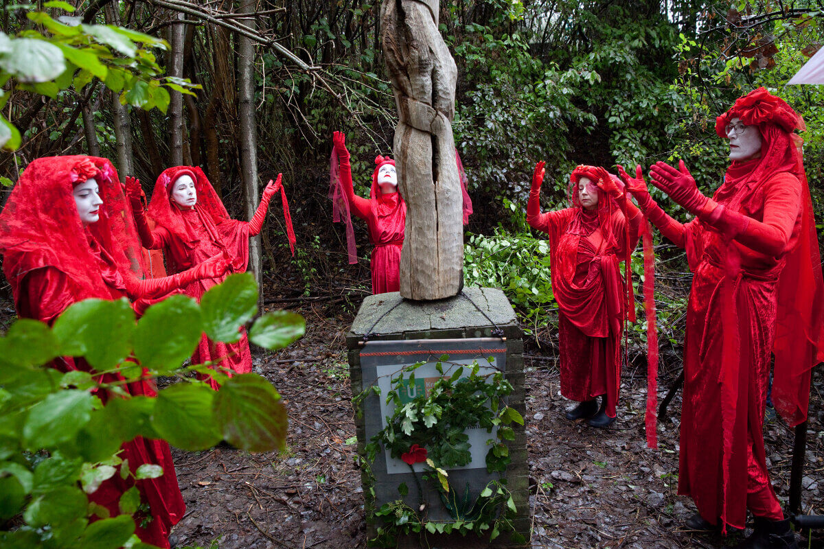 De Red Rebels van Extinction Rebellion hij het Amelisweerd Monument. Foto: RH