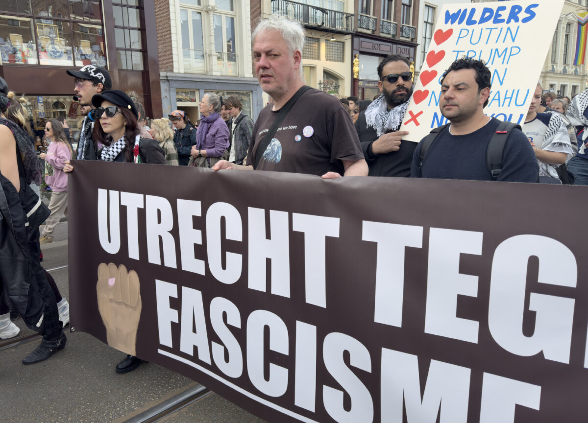 Utrechters lopend van de Dam naar het Museumplein. Foto: Harrie van Veen