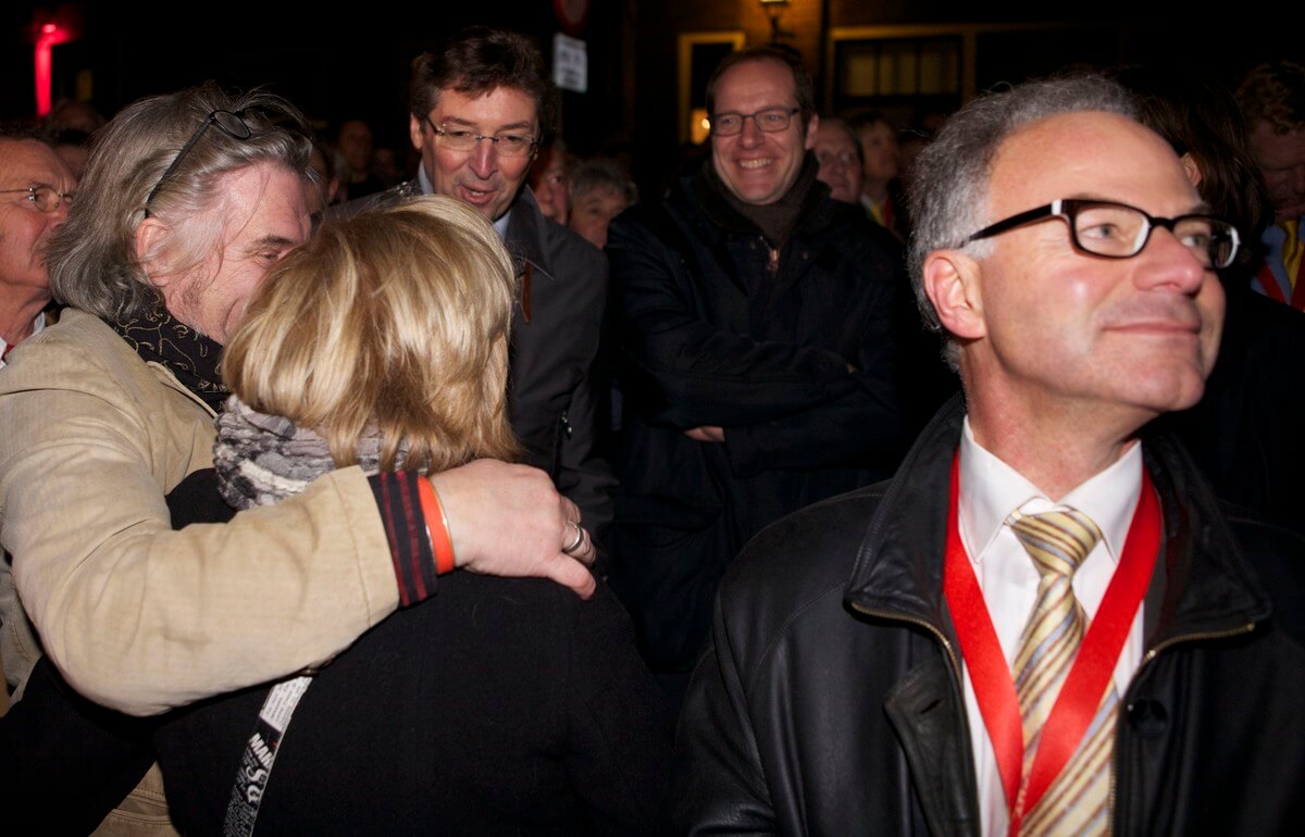 Jo de Viet rechts met achter hem burgemeester Wolfsen en tourdirecteur Prudhomme in 2013. Foto: Ton van den Berg