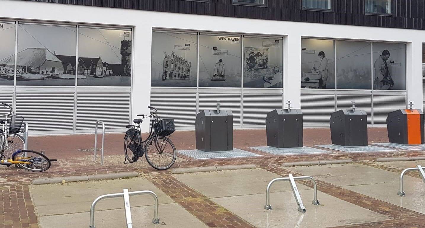 De ramen van gebouw Keramus met foto's arbeiders Westraven. Foto: st.HKT